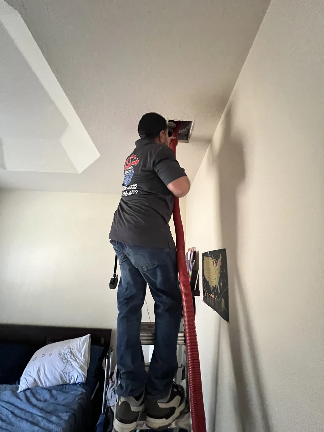 Coastline technician performing residential duct cleaning